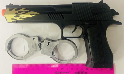 Пистолет-трещотка с наручниками в пакете 27*18*3 (арт.819-21/К)